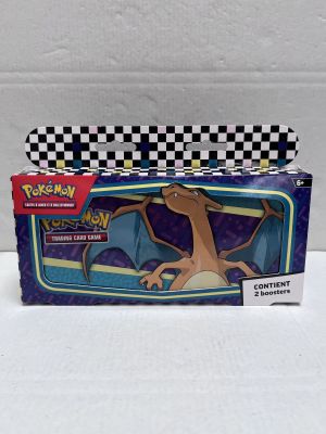 the box has a picture of a dragon on it and a checkered background