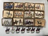 a lot of miniature figurines of men riding horses