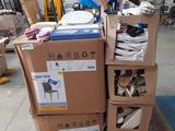 a stack of boxes with bags on top of them