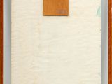 an image of a piece of paper with a piece of wood on top of it