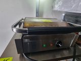 an image of a food warmer on a table in a kitchen
