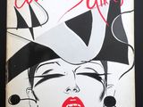 une photo en noir et blanc d'une femme au rouge à lèvres rouge