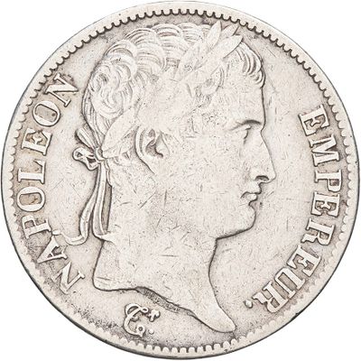 a close up of a coin with a woman ' s head on it