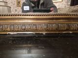 a man that is taking a picture of himself in a mirror