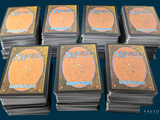 a lot of cards that are stacked on top of each other
