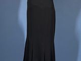 a black and white dress on a mannequin on a mannequin stand