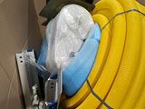 a cardboard box with a bunch of hoses in it