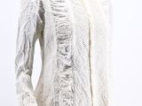 an image of a white shirt on a mannequin stand