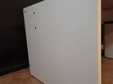 a white box that is sitting on the floor