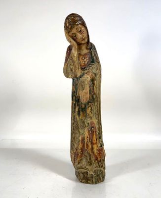 an image of a statue of a woman holding a baby
