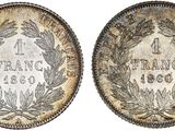 a silver dollar coin with a crown on the reverse side and a crown on the reverse side