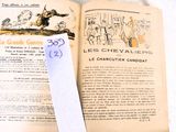 un livre ouvert, sur lequel est collé un autocollant, posé sur une table