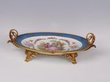 an image of a decorative plate with a lady and child on it