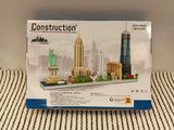 a box with a model of the statue of liberty on it