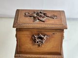 pair of wooden boxes on a table with a white background
