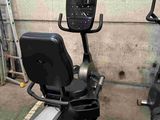 an image of a stationary exercise bike in a garage