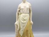 an image of a statue of a woman holding a bucket