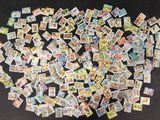 a lot of pokemon cards on the table