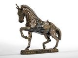 statue of a horse on a wooden base on a white background