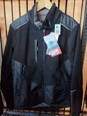 the jacket is hanging on a rack in the store