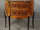 an image of a marble top chest of drawers on a stand