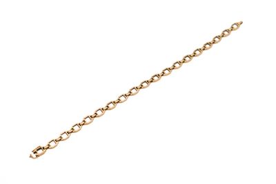 a close up of a gold chain on a white background