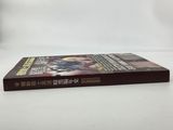 a close up of a book on a table with a white background