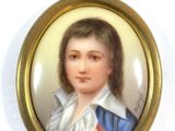 portrait of a young woman in a blue coat and white blouse