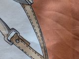 a scarf with a picture of a pair of scissors and a pair of scissors