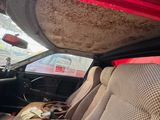 a dirty seat in the back of a car