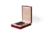 a box that has a pen and a wallet in it