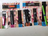 a lot of different types of mascaras on the table