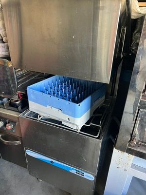 an image of a dishwasher and a stove in a kitchen