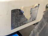 a close up of a label on a sewing machine