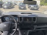 a dashboard of a car with many cars in the background