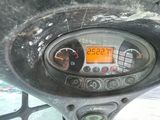 a close up of a car dashboard with a clock on it