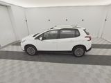 a picture of a white car parked in a garage