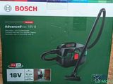 the box of the bosch vacuum cleaner is open on the table