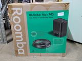 packaging for a roombaby max 205 vacuum cleaner in a store