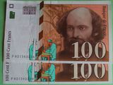 a close up of a piece of paper with a picture of a man on it