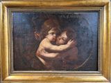 une peinture à l'huile représentant deux enfants enlacés, dans un cadre doré