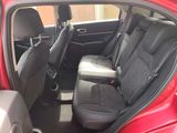 a red car with black seats in the back of it