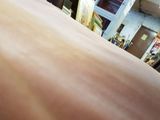 a close up view of a person ' s back with a surfboard