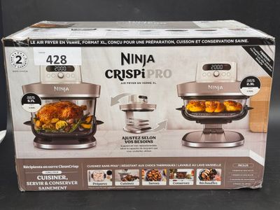 boxed box of ninja crispi pro with chicken and vegetables in it