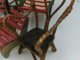 four chairs that are sitting next to each other on the floor