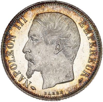 a close up of a coin with a man ' s face on it