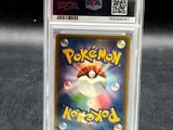 a close up of a pokemon trading card in a plastic holder