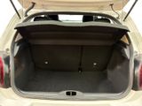 a trunk of a car with the back door open