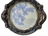 a picture of a picture of a blue and white plate