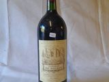 a bottle of wine that is sitting on a table